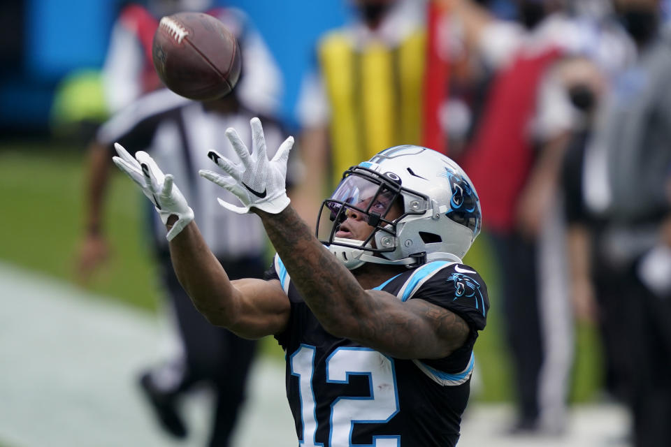 Carolina Panthers wide receiver D.J. Moore catches a pass during the first half of an NFL football game against the Detroit Lions Sunday, Nov. 22, 2020, in Charlotte, N.C. (AP Photo/Gerry Broome)