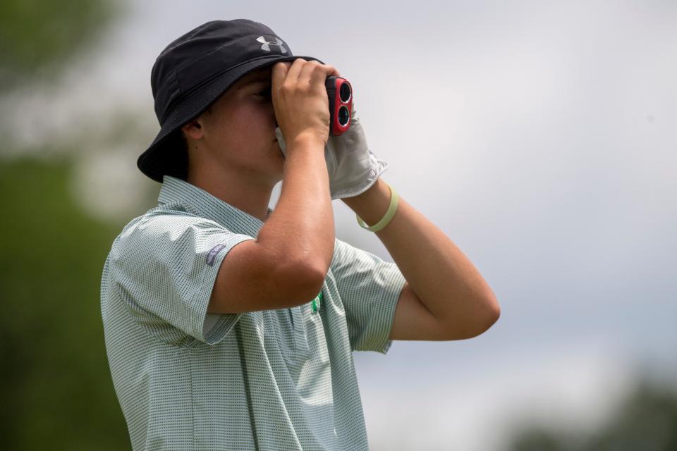 North’s Peyton Butler reads on hole 8 during the IHSAA boys golf sectional at Helfrich Hills Golf Course in Evansville, Ind., Thursday, June 2, 2022. 