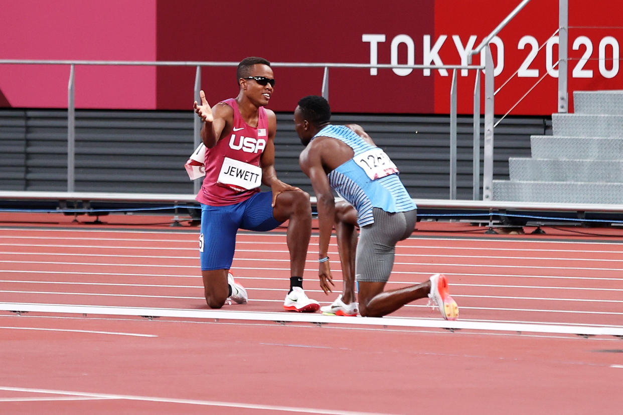 TOKYO, JAPAN - AUGUST 01: Isaiah Jewett of Team United States and Nijel Amos of Team Botswana react after falling in the Men's 800m Semi-Final on day nine of the Tokyo 2020 Olympic Games at Olympic Stadium on August 01, 2021 in Tokyo, Japan. (Photo by Christian Petersen/Getty Images)