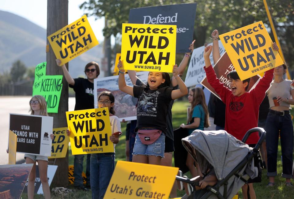 Activists cheer as they wait on 500 South for President Joe Biden’s motorcade to pass on the way to the George E. Wahlen Department of Veterans Affairs Medical Center, where he will deliver remarks, in Salt Lake City on Thursday, Aug. 10, 2023. | Kristin Murphy, Deseret News