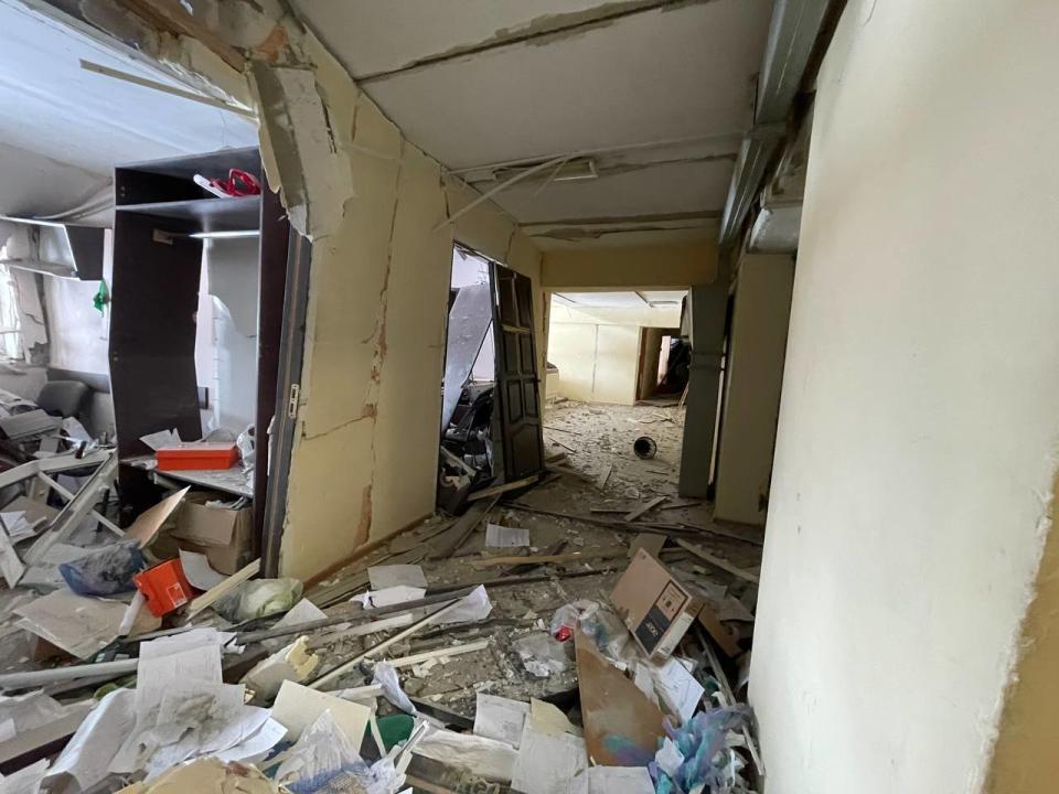 In this photo provided by Yurii Kochubei, a view of the damage after shelling, inside a sports complex, in Kharkiv, Ukraine, Saturday, March 5, 2022. An official in one of Ukraine's pro-Russia separatist region says Russian forces will observe a temporary cease-fire Sunday in two Ukrainian cities. An agreement to allow civilians to evacuate collapsed a day earlier amid continued shelling and the flight of refugees to neighboring nations. (Yurii Kochubei via AP)