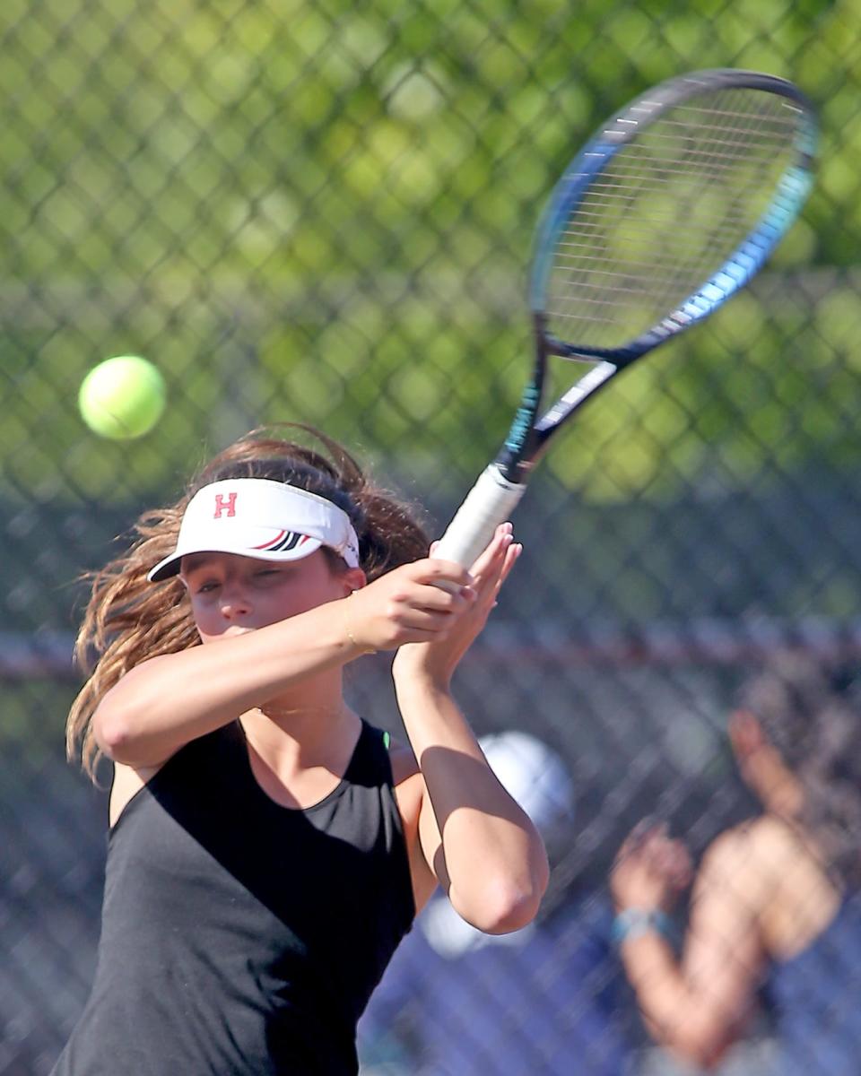 Hingham #3 Sam Ruddick fires a forehand return during her Round of 32 match against Shrewsbury in the Division 1 state tournament at Hingham High on Wednesday, May 31, 2023.