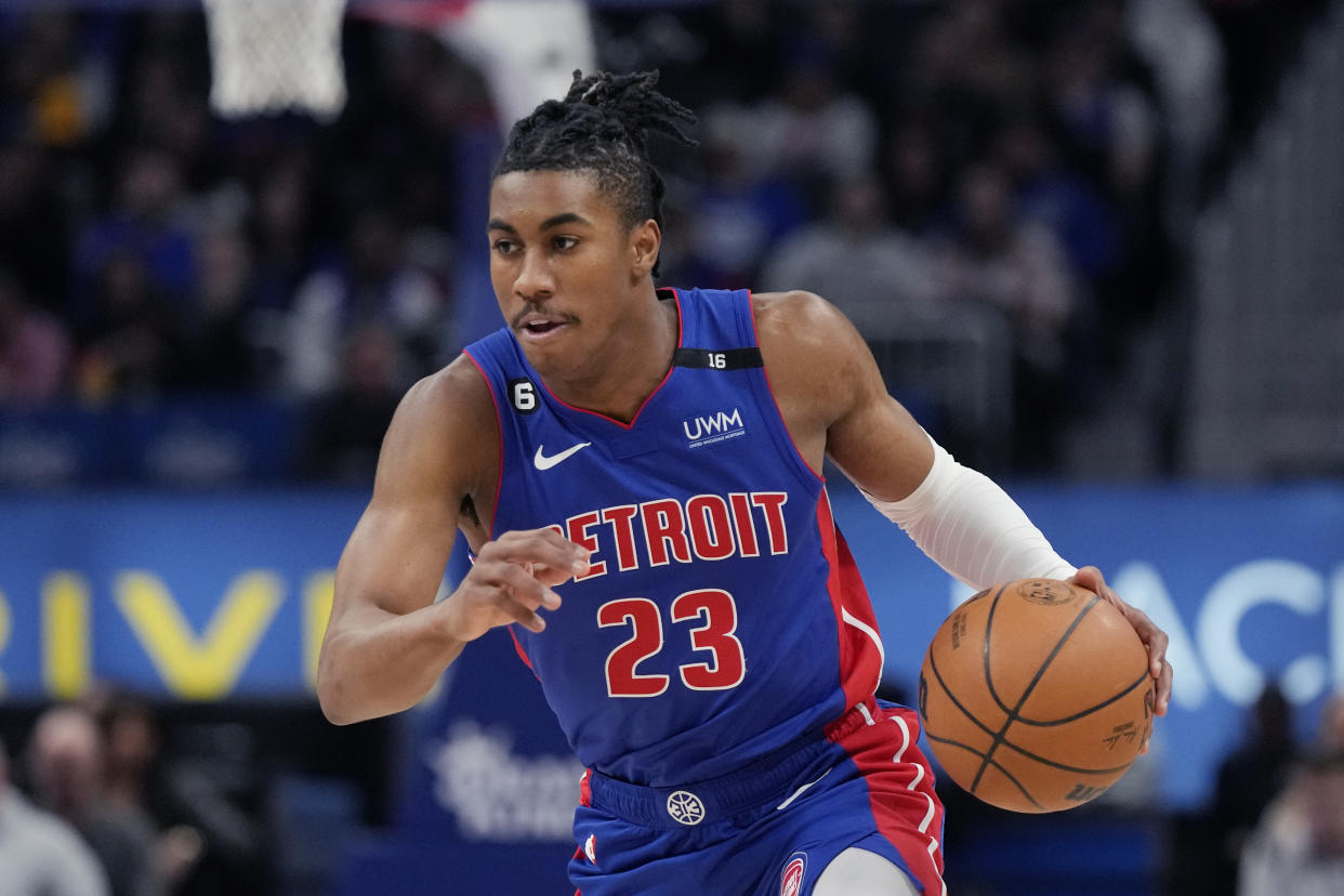 Detroit Pistons guard Jaden Ivey brings the ball up the court during the first half against the Dallas Mavericks on Dec. 1, 2022, in Detroit. (AP Photo/Carlos Osorio)