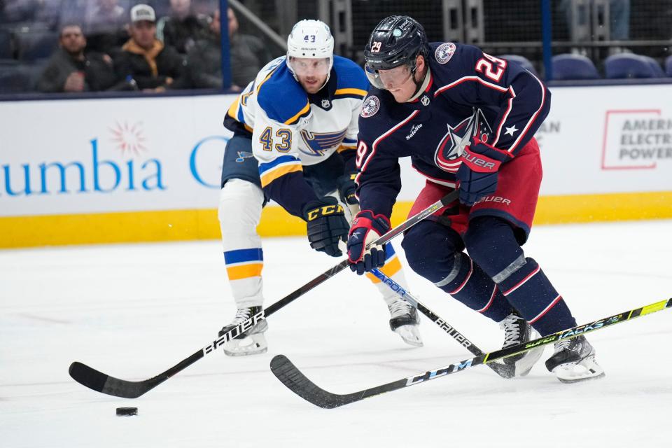 Oct 6, 2022; Columbus, Ohio, United States; Columbus Blue Jackets forward Patrik Laine (29) is defended by St. Louis Blues defenseman Calle Rosen (43) during the first period of the preseason game at Nationwide Arena. Mandatory Credit: Joseph Scheller-The Columbus Dispatch 