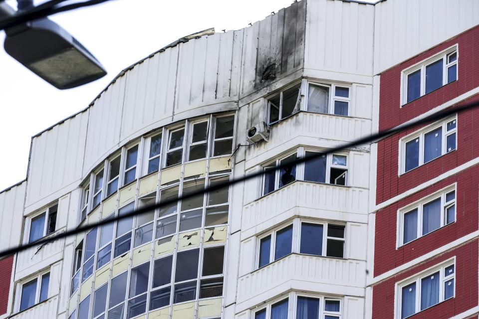 This photo shows a part of an apartment building which was reportedly damaged by Ukrainian drone in Moscow, Russia, Tuesday, May 30, 2023. In Moscow, residents reported hearing explosions and Mayor Sergei Sobyanin later confirmed there had been a drone attack that he said caused "insignificant" damage. (AP Photo)
