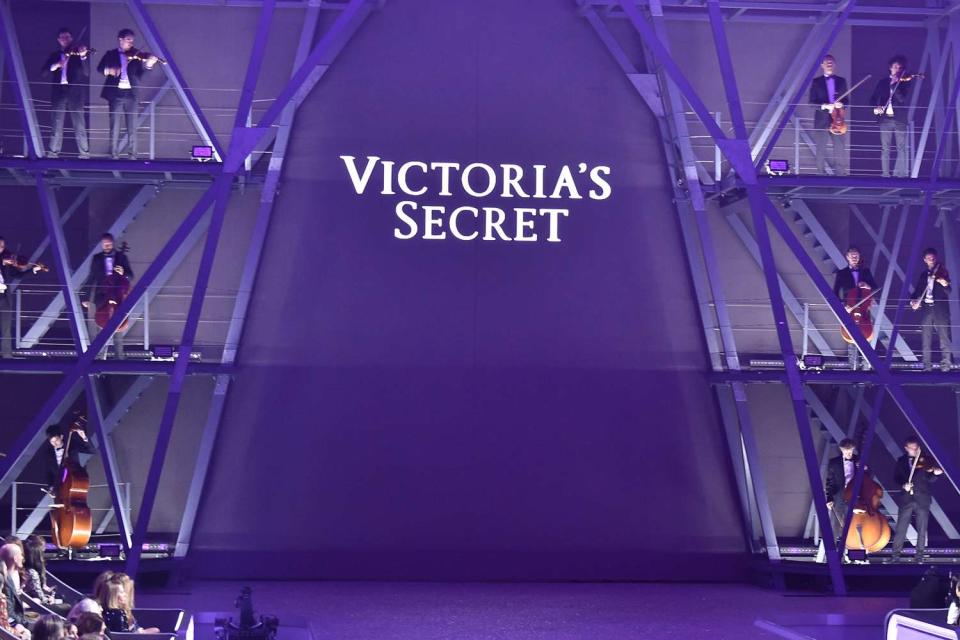 <p>Victor VIRGILE/Gamma-Rapho via Getty</p> A model walks the runway during the 2016 Victoria