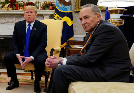 U.S. President Donald Trump speaks while meeting with Senate Democratic Leader Chuck Schumer (D-NY) in the Oval Office of the White House in Washington, U.S., December 11, 2018. REUTERS/Kevin Lamarque