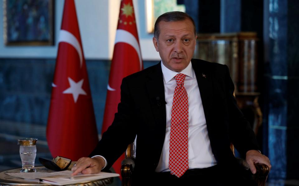 President Recept Tayyip Erdogan blames the Gulenists for last year's coup - Credit:  REUTERS/Umit Bektas