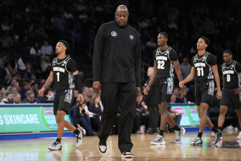 Georgetown Hoyas head coach Patrick Ewing walks the court during a timeout in the second half of an NCAA college basketball game against Villanova during the first round of the Big East conference tournament, Wednesday, March 8, 2023, in New York. (AP Photo/John Minchillo)
