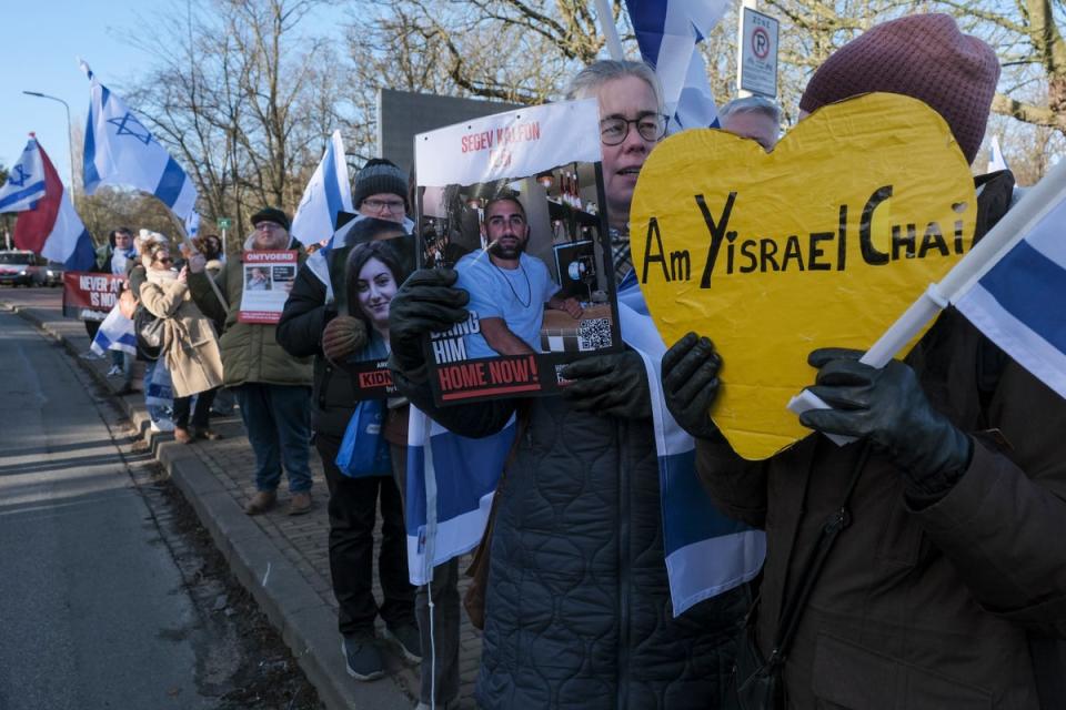 Pro-Israel activists gather near the International Court of Justice, or World Court, in The Hague, Netherlands, on Friday (AP)