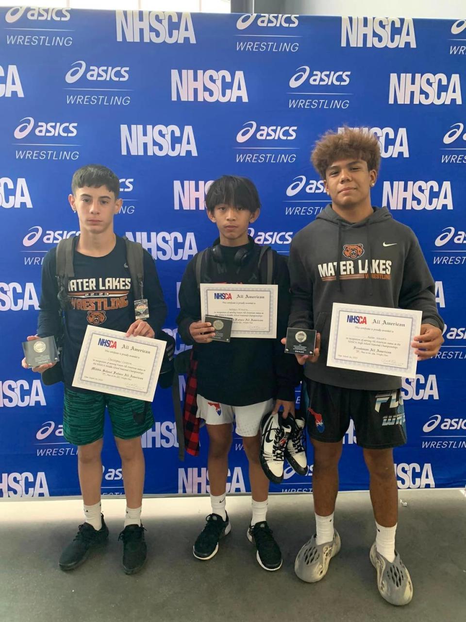 Christopher Greene, Keagan Mesina and Kalias Nazario of Mater Lakes Academy wrestling earned All American honors. 