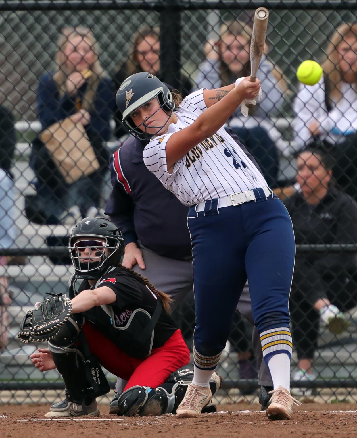 Tallmadge's Kathryn Headrick hits a single to left field during the second inning of a game against Kent Roosevelt on April 10 in Tallmadge.
