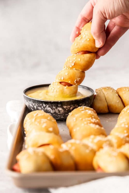 <p>Sustainable Cooks</p><p>These air fryer pretzel dogs are easy to make and taste incredible! You’ll love these pretzel hot dogs for a fast dinner, after-school snack or game-day treat.</p><p><strong>Get the recipe: <a href="https://www.sustainablecooks.com/air-fryer-pretzel-dogs/" rel="nofollow noopener" target="_blank" data-ylk="slk:Air Fryer Pretzel Dogs;elm:context_link;itc:0;sec:content-canvas" class="link ">Air Fryer Pretzel Dogs</a></strong></p>