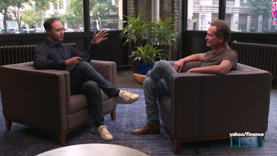 Former PayPal CEO Dan Schulman (right) reflects on his leadership journey inside the PayPal NYC headquarter he opened with Yahoo Finance Executive Editor Brian Sozzi (left).