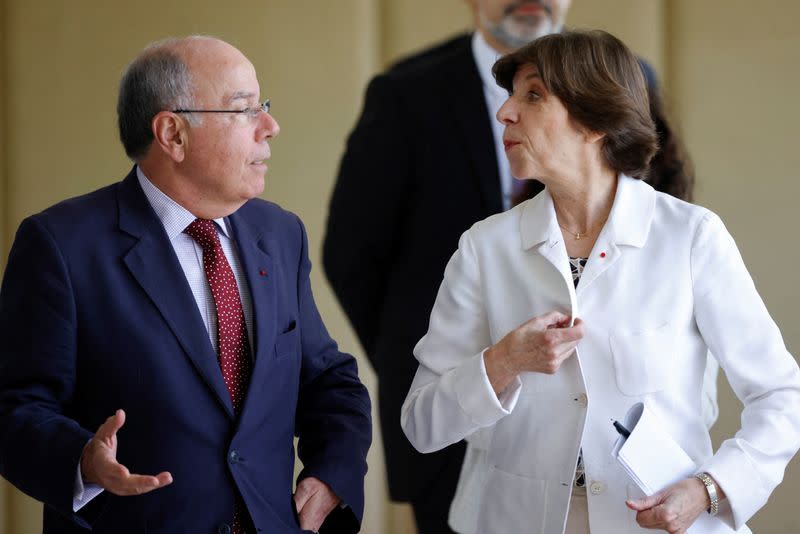 Brazil's Foreign Minister Mauro Vieira talks with French Foreign Minister Catherine Colonna before a news conference at Itamaraty Palace in Brasilia