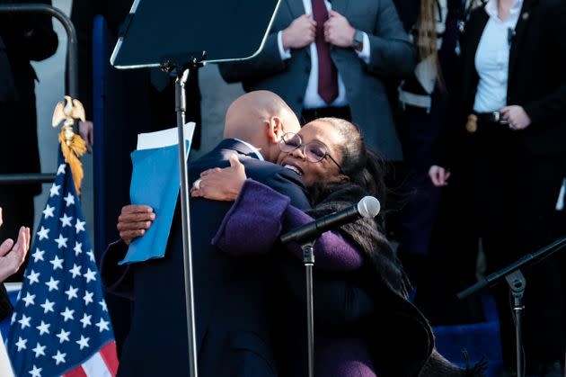 Wes Moore hugs Oprah Winfrey, who introduced Moore at his inauguration. 