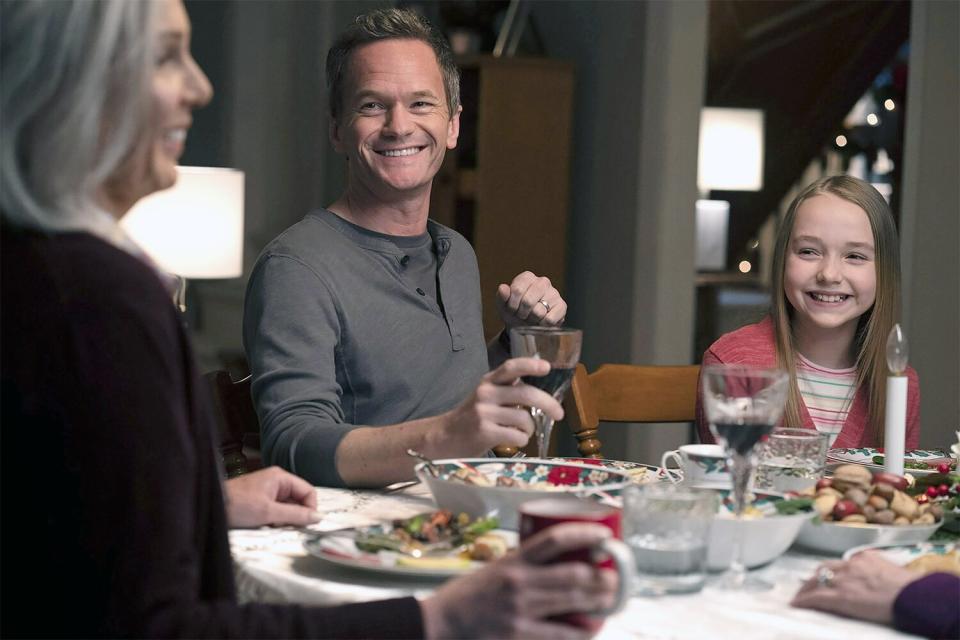 (L-r) JUNE DIANE RAPHAEL as Kathy Doyle, NEIL PATRICK HARRIS as Jake Doyle and SOPHIA REID-GANTZERT as Annie Doyle in New Line Cinema and HBO Max’s family film “8-BIT CHRISTMAS.” Photo by Sabrina Lantos