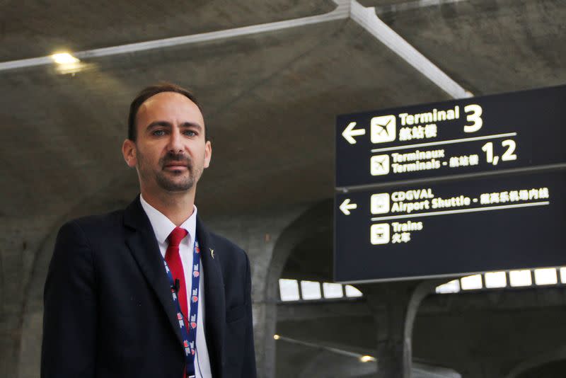 French airport worker Loris Foreman poses during an interview with Reuters at the Paris-Charles de Gaulle airport in Roissy