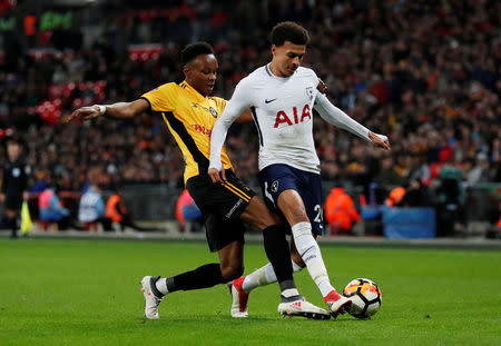 Soccer Football - FA Cup Fourth Round Replay - Tottenham Hotspur vs Newport County - Wembley Stadium, London, Britain - February 7, 2018 Tottenham's Dele Alli in action with Newport County's Shawn McCoulsky Action Images via Reuters/Peter Cziborra