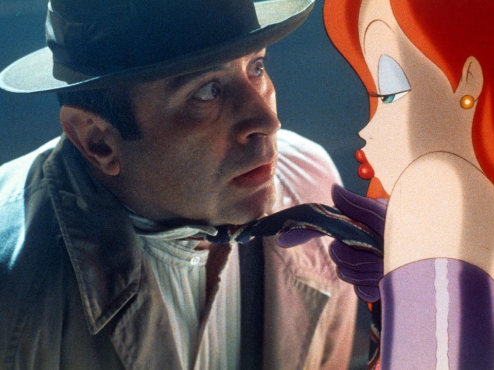 Bob Hoskins is seduced by Jessica Rabbit in a scene from the film 'Who Framed Roger Rabbit'