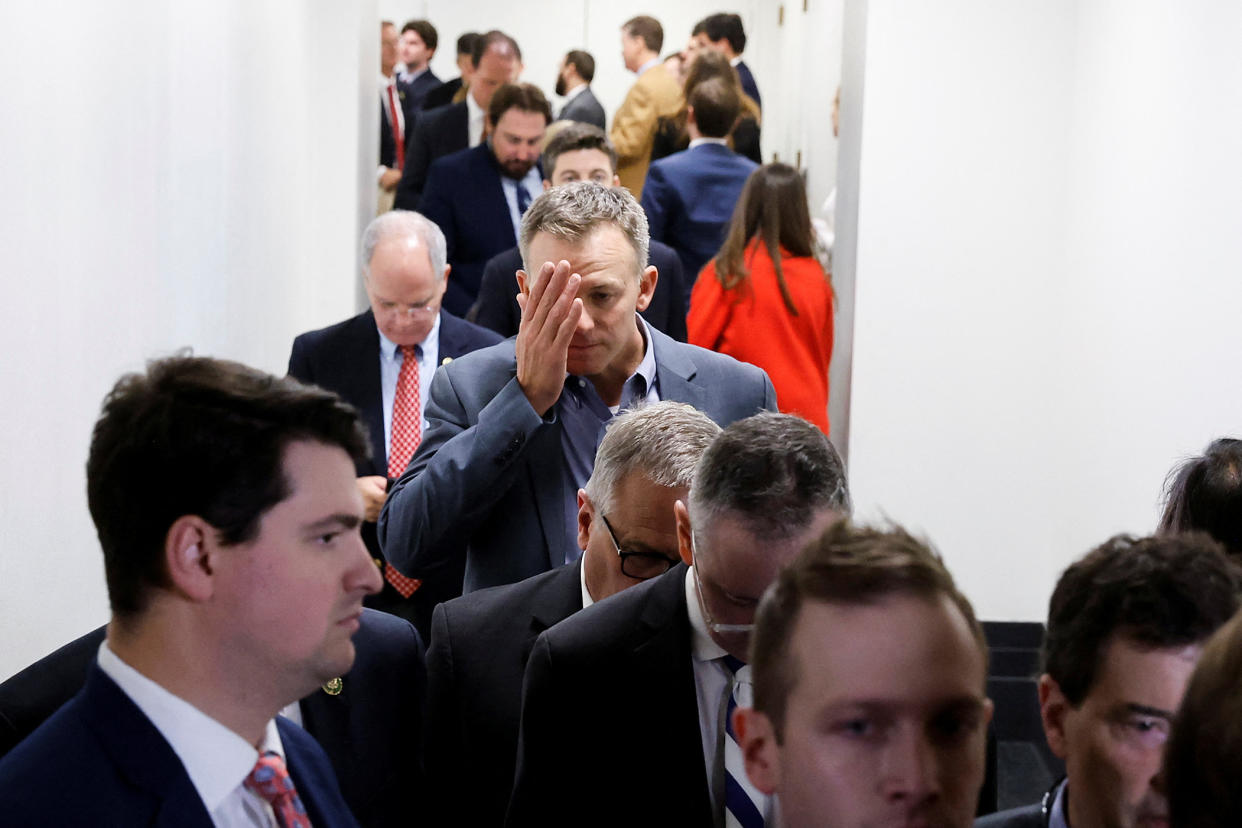 U.S. Representative Blake Moore of Utah and fellow House Republicans depart after a conference meeting where they held a secret ballot vote on whether to drop Ohio Rep. Jim Jordan out of the race for house Speaker at the U.S. Capitol on Oct. 20.