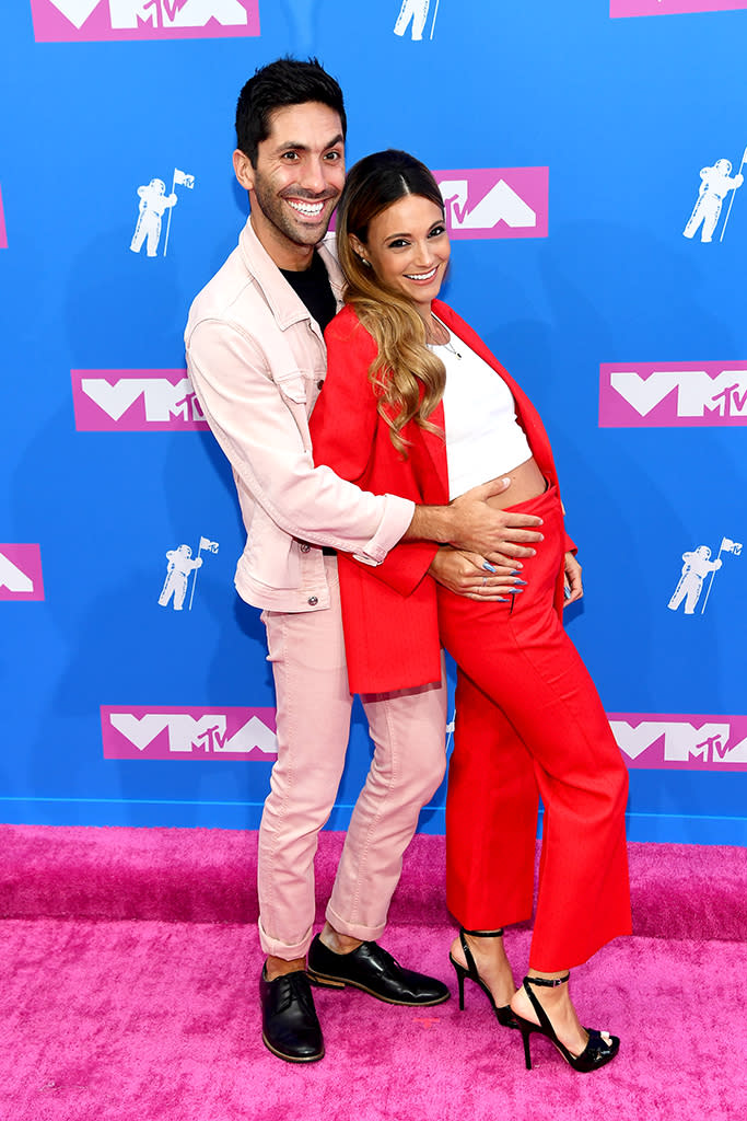 <p>Nev Schulman and Laura Perlongo attend the 2018 MTV Video Music Awards at Radio City Music Hall on August 20, 2018 in New York City. (Photo: Nicholas Hunt/Getty Images for MTV) </p>