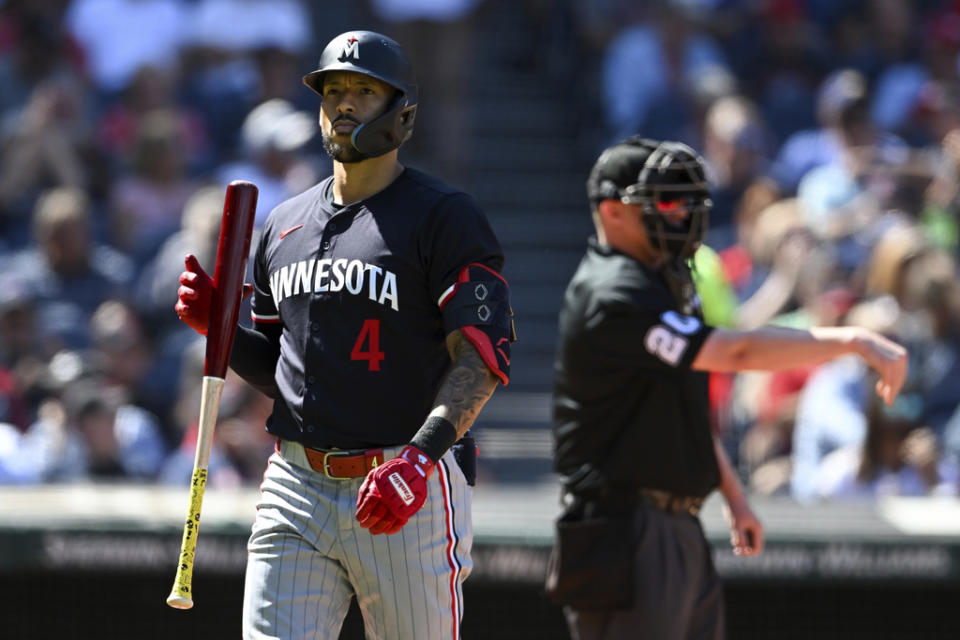 Minnesota Twins’ Carlos Correa reacts after striking out during the third inning of a baseball game against the Cleveland Guardians, Thursday, Sept. 19, 2024, in Cleveland. (AP Photo/Nick Cammett)