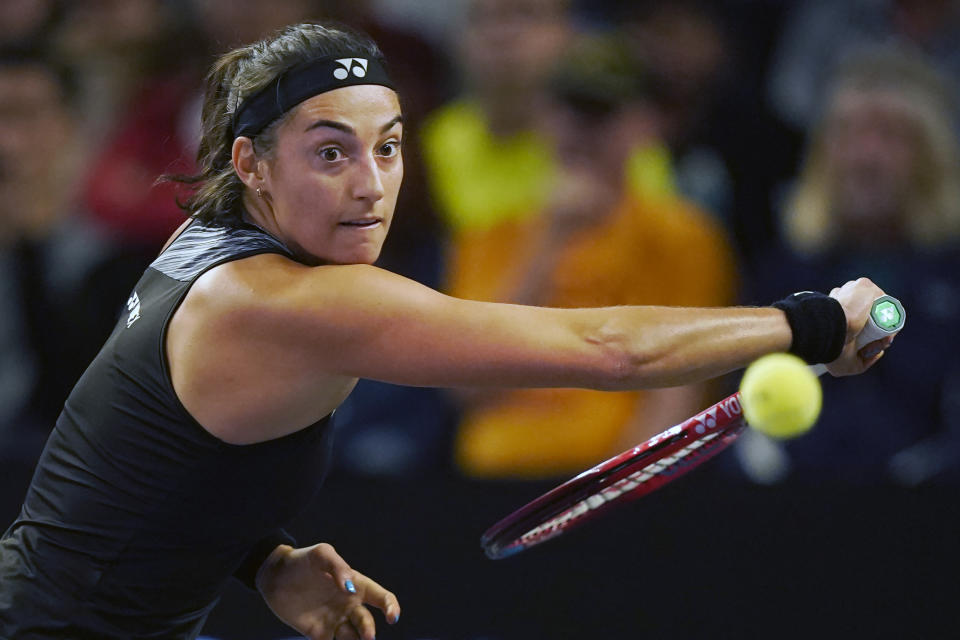 Caroline Garcia of France returns a shot in the third set against Daria Kasatkina of Russia during round-robin play on day six of the WTA Finals tennis tournament in Fort Worth, Texas, Saturday, Nov. 5, 2022. (AP Photo/LM Otero)