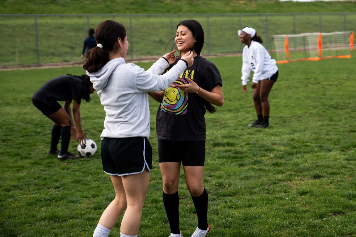 The North High girl's soccer team warm up for practice Thursday, April 18, 2024, at North High in Des Moines.