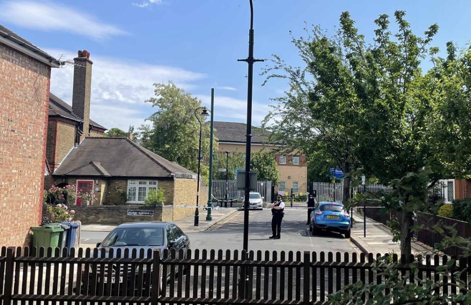 Police at the scene in Ealing, west London (Ted Hennessey/PA) (PA Wire)