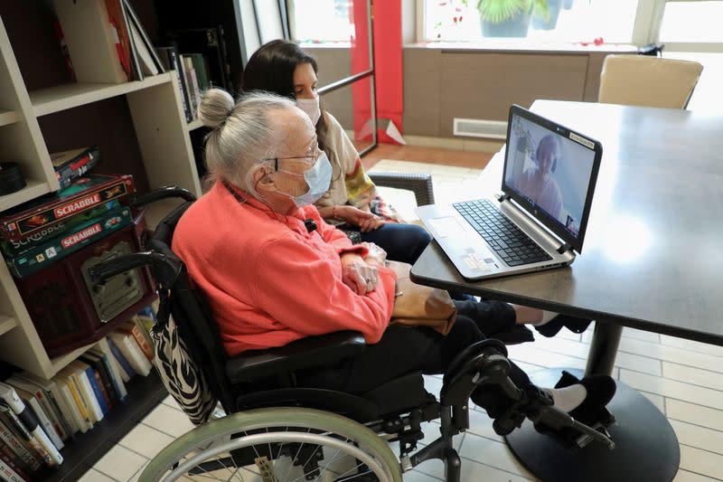 Elderly people and students studying French use video conference to beat lockdown blues