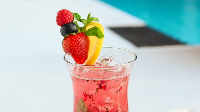 sparkling pink drink with fruit