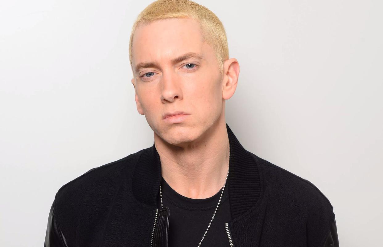 Eminem poses for a photo