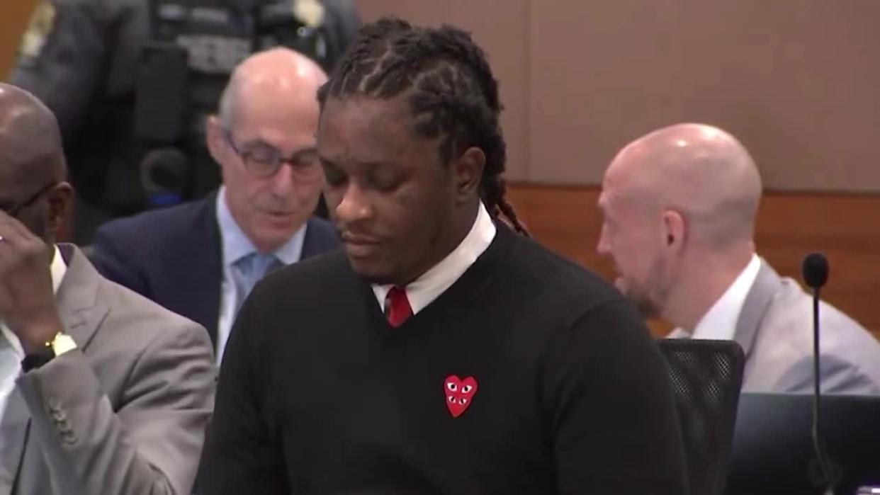 <div>Young Thug, whose legal name is Jeffery Williams, sits in a Fulton County courtroom during the YSL RICO trial wearing a Comme Des Garcons Play sweater on Jan. 11, 2024.</div> <strong>(FOX 5)</strong>