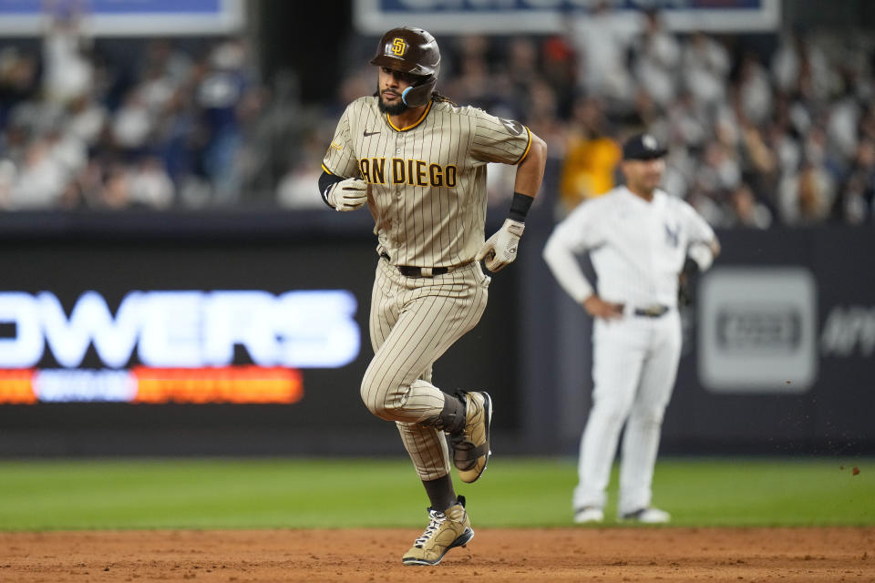 San Diego Padres' Fernando Tatis Jr. runs the bases after hitting a two-run home run during the sixth inning of a baseball game against the New York Yankees, Friday, May 26, 2023, in New York. (AP Photo/Frank Franklin II)