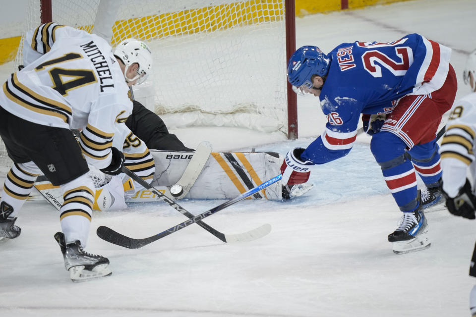 New York Rangers left wing Jimmy Vesey (26) scores a goal during the second period an NHL hockey game against the Boston Bruins, Saturday, Nov. 25, 2023, in New York. (AP Photo/Bryan Woolston)