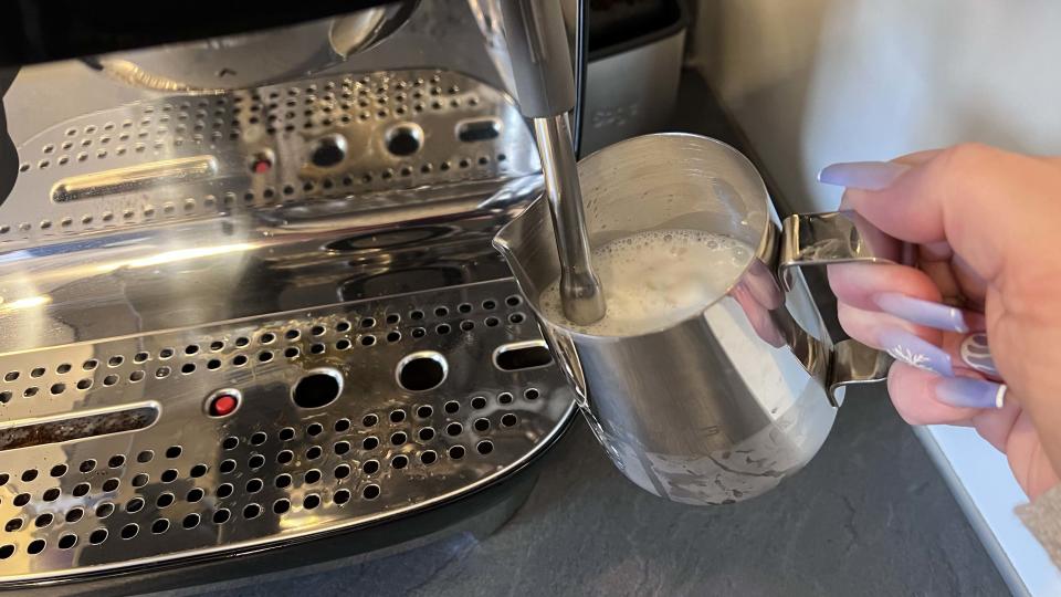 Milk being frothed and steamed