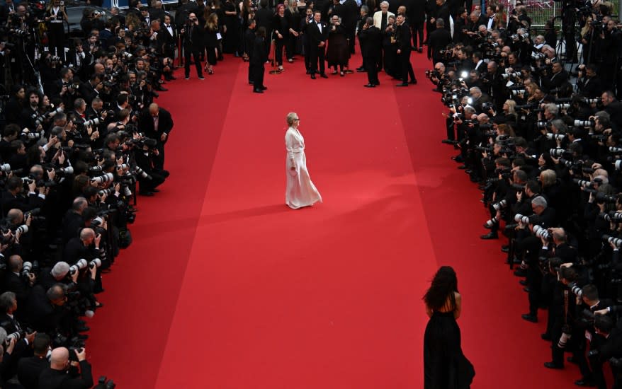 Meryl Streep walking on the red carpet at the 77th Cannes Film Festival for the screening of 'Le Deuxieme Acte'