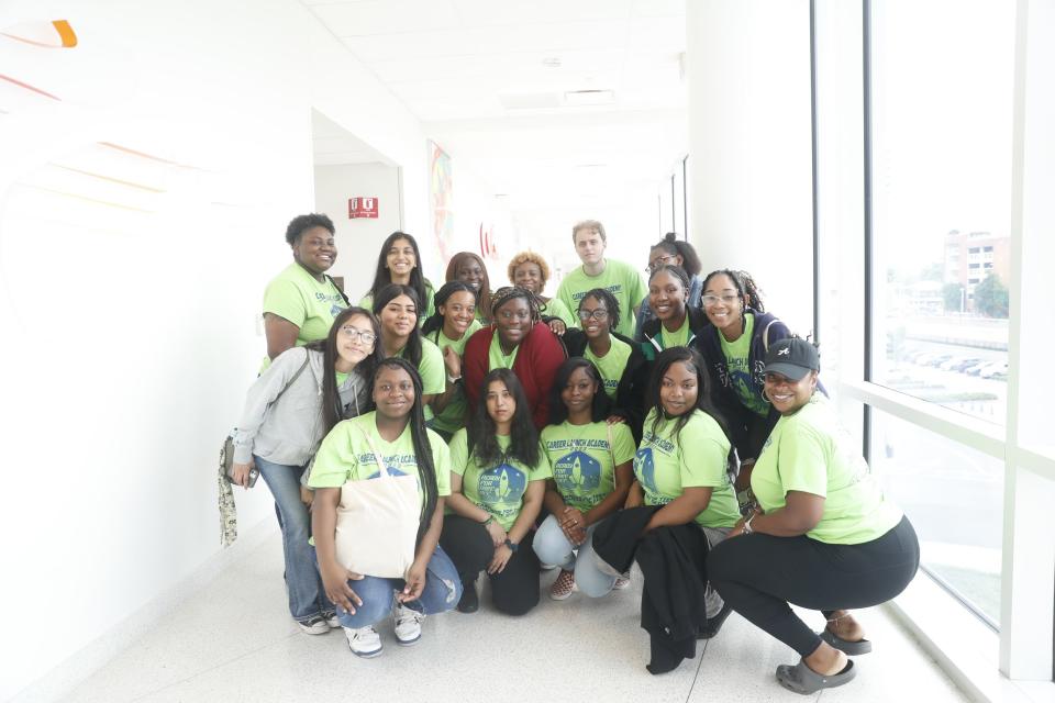 Methodist Le Bonheur Healthcare gives an inside look at its Career Launch Academy. The program is for high school juniors and seniors from Memphis-Shelby County Schools and local charter schools who have expressed an interest in careers in healthcare. The tour was given on July 7, 2023 at Methodist University Hospital in Memphis, Tenn. The students pose for a photo in a hallway inside the hospital.