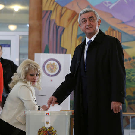 Armenia's President Serzh Sarksyan casts his ballot during a parliamentary election at a poling station in Yerevan, Armenia April 2, 2017. REUTERS/Vahram Baghdasaryan/Photolure