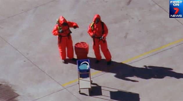 A Hazmat team at the Australia Post Centre in Sydney's south-west. Photo: First on 7