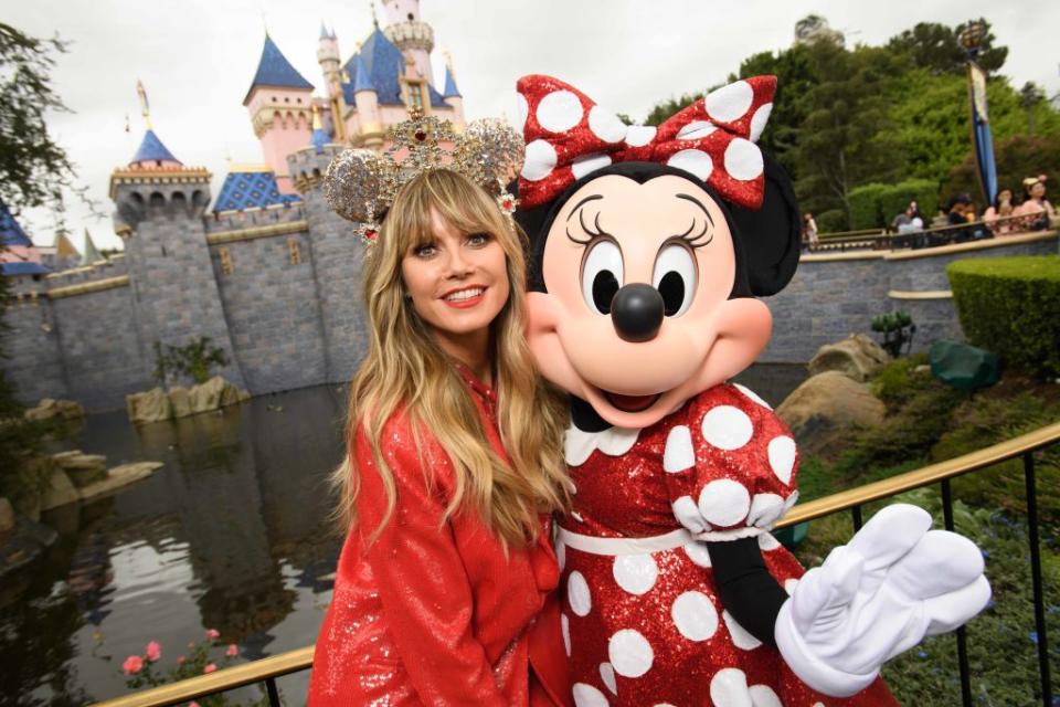 Disneyland fans such as Heidi Klum can buy tickets now at a discount. (Photo: Richard Harbaugh/Disneyland Resort via Getty Images)