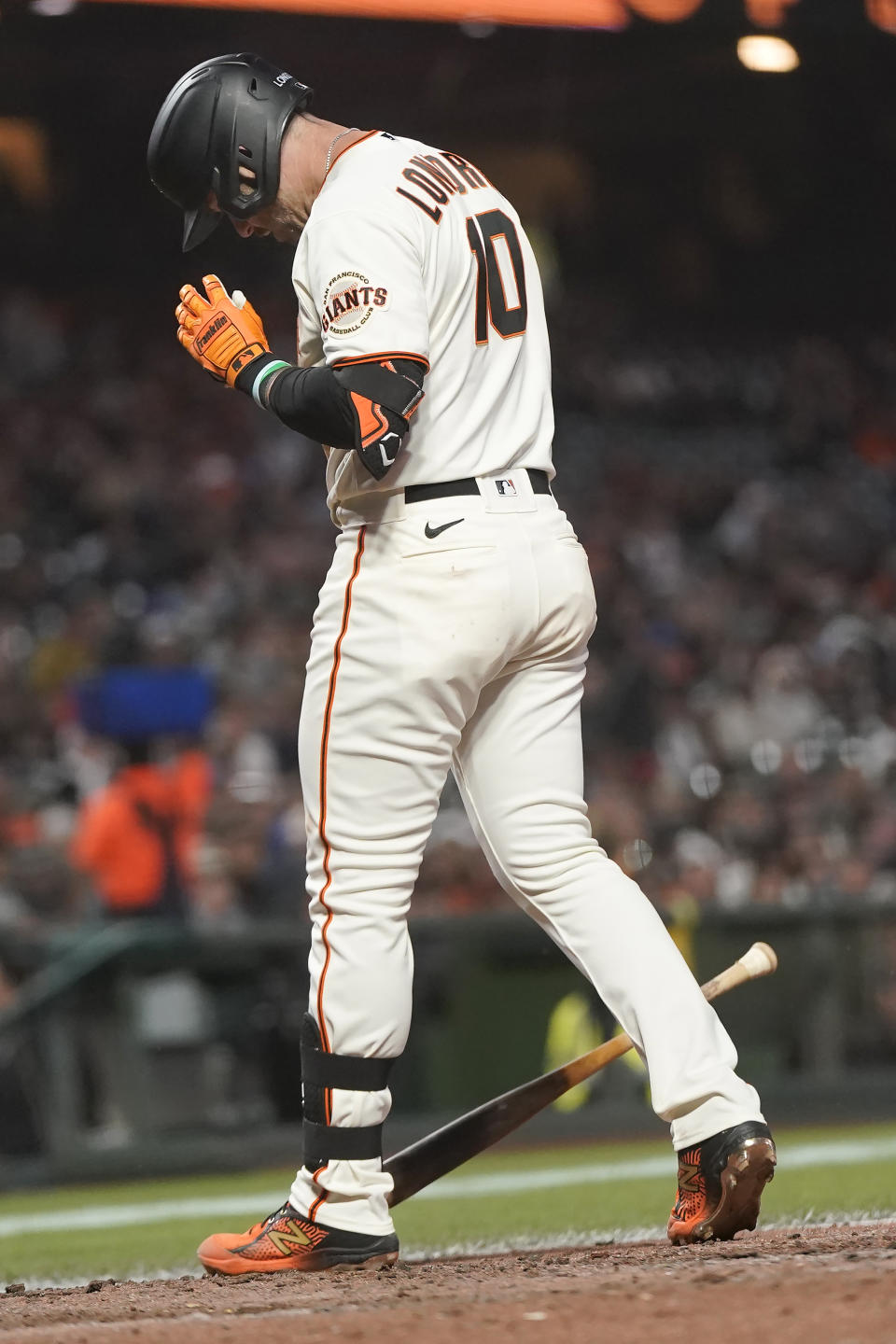 San Francisco Giants' Evan Longoria reacts after striking out against the New York Mets during the sixth inning of a baseball game in San Francisco, Monday, May 23, 2022. (AP Photo/Jeff Chiu)