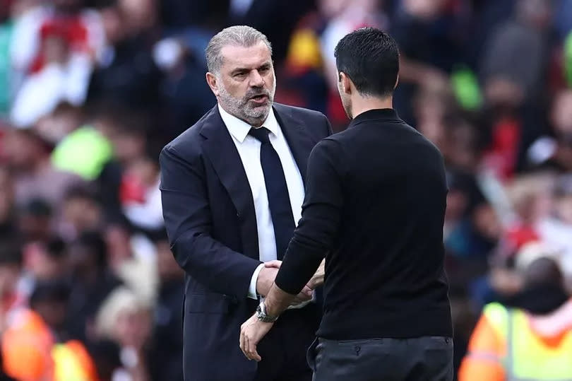 Ange Postecoglou shakes hands with Mikel Arteta