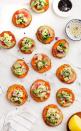 <p>Looking for something fresh (and vegan)? These adorable roasted rounds will fit the bill.</p><p><em>Get the recipe at <a href="https://www.loveandlemons.com/sweet-potato-appetizer-bites/" rel="nofollow noopener" target="_blank" data-ylk="slk:Love & Lemons;elm:context_link;itc:0;sec:content-canvas" class="link ">Love & Lemons</a>.</em></p>