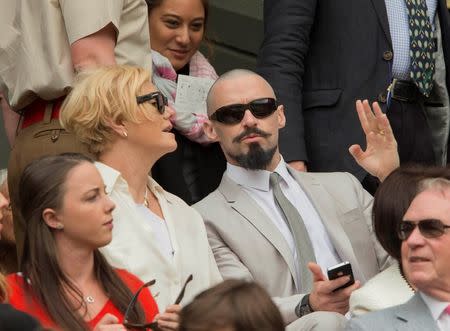 Jul 6, 2014; London, United Kingdom; Movie actor Hugh Jackman in attendance for the match between Novak Djokovic (SRB) and Roger Federer (SUI) on day 13 of the 2014 Wimbledon Championships at the All England Lawn and Tennis Club. Susan Mullane-USA TODAY Sports