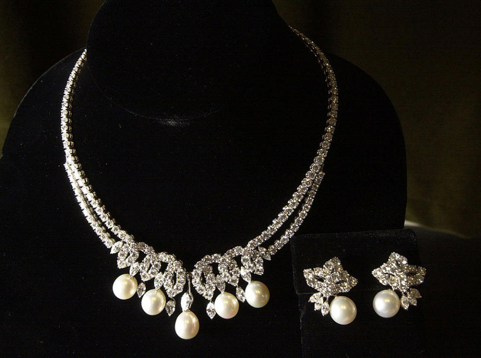 382192 04: Princess Diana's "Swan Lake Diamonds" necklace and earrings appear at the Wall Street Rarities retail gallery November 20, 2000 in New York City. The pearl and diamond-encrusted jewelry, custom made for the late Princess by the Royal Family's Crown Jeweler, was worn by Princess Diana at her final public appearance. The necklace and earrings will be auctioned off at an event called "The Ultimate Auction" December 1, 2000 which will later be broadcasted by the Fox television network. (Photo by Chris Hondros/Newsmakers)