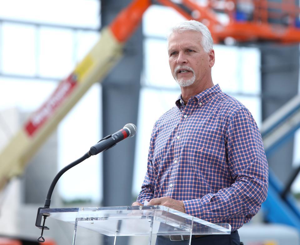 Florida senator Keith Perry talks about a new sports complex during a beam signing ceremony in Gainesville, FL.