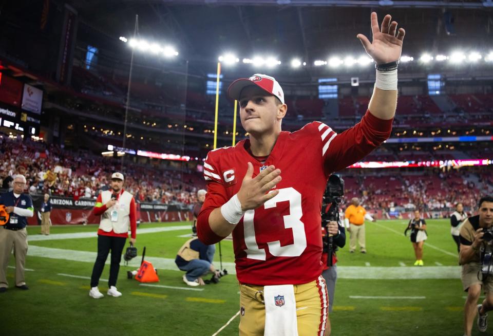 Dec 17, 2023; Glendale, Arizona, USA; San Francisco 49ers quarterback Brock Purdy (13) celebrates following the game against the Arizona Cardinals at State Farm Stadium. Mandatory Credit: Mark J. Rebilas-USA TODAY Sports