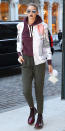 <p>Hadid matched her bold maroon lip from head to toe, with a berry-colored hoodie and red Dr. Martens boots ($59; <a rel="nofollow noopener" href="https://www.amazon.com/Dr-Martens-Womens-Pascal-Leather/dp/B005GUAFMW/" target="_blank" data-ylk="slk:amazon.com;elm:context_link;itc:0;sec:content-canvas" class="link ">amazon.com</a>). She added mirrored sunglasses, a printed bomber, and olive-colored joggers to complete the look.</p>